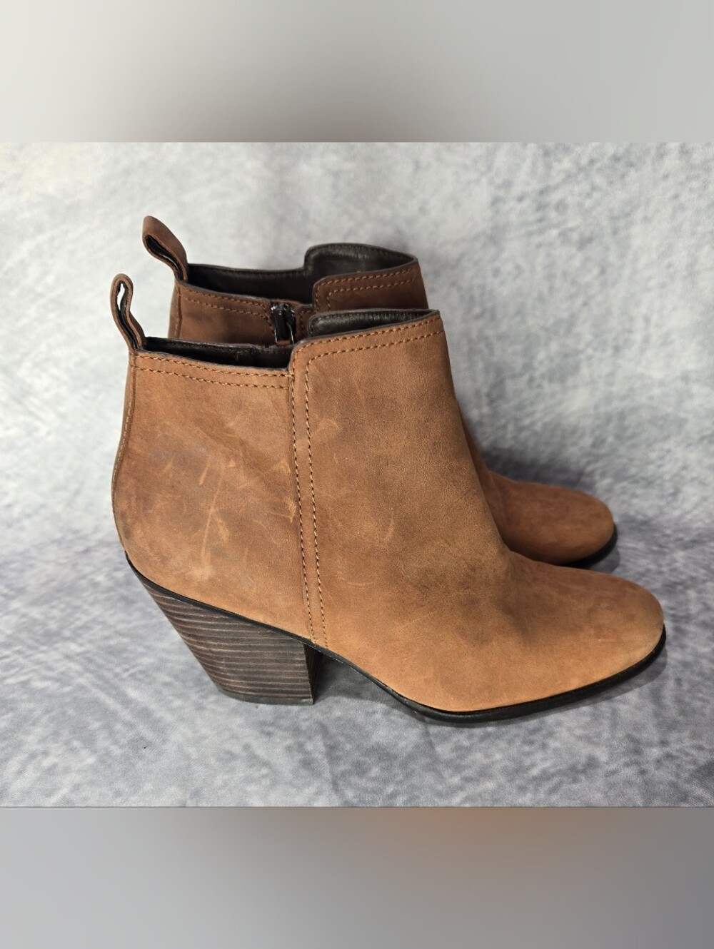Cole Haan Chesney Booties crafted in a rich cognac brown leather with a classic